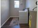 Laundry room with washer, dryer, and water heater at 214 Genet Ct, Sun City Center, FL 33573