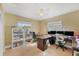 Bright home office features built-in shelving and wood flooring at 2215 39Th W St, Bradenton, FL 34205