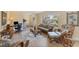 Bright living room featuring rattan furniture and wood-look floors at 2215 39Th W St, Bradenton, FL 34205