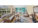 Spacious living room showcasing wicker furniture and natural light at 2215 39Th W St, Bradenton, FL 34205