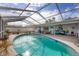 Enjoy this refreshing pool with a screened enclosure at 2215 39Th W St, Bradenton, FL 34205