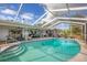 Large screened-in pool perfect for relaxation at 2215 39Th W St, Bradenton, FL 34205