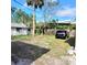 Spacious backyard with a detached shed and ample parking space at 2253 Arlington St, Sarasota, FL 34239