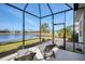 Relaxing screened lanai with pond views at 3405 Box Turtle Ter, Parrish, FL 34219