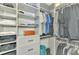 Large walk-in closet with ample storage space for clothes and accessories at 3405 Box Turtle Ter, Parrish, FL 34219