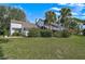 Single story home with lush landscaping and large yard at 3970 Prairie Dunes Dr, Sarasota, FL 34238