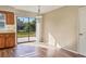 Dining area adjacent to the kitchen with sliding glass doors offering backyard views at 4064 Velarde Ln, Sarasota, FL 34235