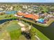 Aerial view of community, golf course, and amenities at 4213 Pro Am E Ave, Bradenton, FL 34203