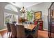 Bright dining room with a large table, wicker chairs, and decorative accents at 4213 Pro Am E Ave, Bradenton, FL 34203