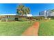 Attractive community center with landscaped grounds at 4550 Pinebrook Cir # 304, Bradenton, FL 34209