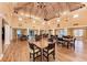 Spacious community room with high ceilings and multiple tables at 4550 Pinebrook Cir # 304, Bradenton, FL 34209