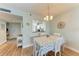 Bright dining room with table and chairs near the kitchen at 4550 Pinebrook Cir # 304, Bradenton, FL 34209