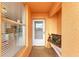 Condo entryway with white door and decorative elements at 4550 Pinebrook Cir # 304, Bradenton, FL 34209