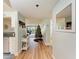 Condo hallway with view into living room and Christmas tree at 4550 Pinebrook Cir # 304, Bradenton, FL 34209