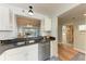 Kitchen features updated white cabinets and stainless steel appliances at 4550 Pinebrook Cir # 304, Bradenton, FL 34209