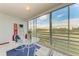 Spacious lanai with glass doors overlooking golf course at 4550 Pinebrook Cir # 304, Bradenton, FL 34209
