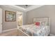 Bedroom with ensuite access and coordinated decor at 5737 Semolino St, Nokomis, FL 34275