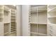 Spacious walk-in closet with custom built-in shelves at 5737 Semolino St, Nokomis, FL 34275