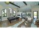 Clubhouse interior with pool table, kitchen area, and sitting area at 5737 Semolino St, Nokomis, FL 34275
