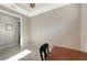 Neutral-toned home office with access to an adjacent room at 5737 Semolino St, Nokomis, FL 34275
