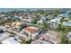 Aerial view of a home under construction in a neighborhood with canals at 579 Bayview Dr, Longboat Key, FL 34228