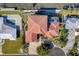 Bird's-eye view of single-Gathering home with red tile roof at 591 Putting Green Ln, Longboat Key, FL 34228