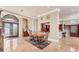 Grand entryway with double doors and staircase leading upstairs at 591 Putting Green Ln, Longboat Key, FL 34228