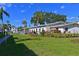 Community features a well-maintained lawn and tropical landscaping at 5927 17Th W St # A21, Bradenton, FL 34207