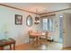 Compact dining area with a round table and chairs at 5927 17Th W St # A21, Bradenton, FL 34207