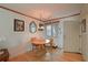 Small dining area with table and chairs near the entryway at 5927 17Th W St # A21, Bradenton, FL 34207