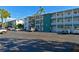 Building exterior showcasing parking and landscaping at 5927 17Th W St # A21, Bradenton, FL 34207