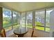Sunroom with multiple windows and a small table at 5927 17Th W St # A21, Bradenton, FL 34207