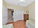 Bedroom with two twin beds, a dresser, and a closet at 616 Misty Pond Ct, Bradenton, FL 34212