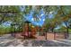 playground with playset and fenced area at 616 Misty Pond Ct, Bradenton, FL 34212