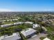 Aerial view of community neighborhood with lake view at 6913 8Th W Ave, Bradenton, FL 34209