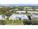 Scenic aerial view of a residential community with well-maintained homes, green spaces, and mature trees at 6913 8Th W Ave, Bradenton, FL 34209