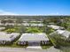 Aerial view of community neighborhood with manicured lawns at 6913 8Th W Ave, Bradenton, FL 34209