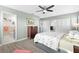 Spacious bedroom with en suite bathroom, ceiling fan and closet at 6913 8Th W Ave, Bradenton, FL 34209