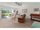 Bright living room with patio access and views of backyard at 6913 8Th W Ave, Bradenton, FL 34209
