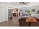 Open concept living area with kitchen, dining, and access to outdoor living space at 6913 8Th W Ave, Bradenton, FL 34209