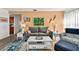 Stylish living room showcasing comfortable seating and vibrant wall art at 6913 8Th W Ave, Bradenton, FL 34209