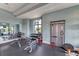 Weight training area, including weight benches, free weights and a full mirror at 7130 Whittlebury Trl, Bradenton, FL 34202
