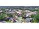 Aerial view of a residential neighborhood with various houses and landscaping at 722 Sailfish Dr, Brandon, FL 33511