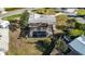 Aerial view of home with screened-in pool at 806 Arlington Rd, Palmetto, FL 34221