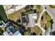 Aerial view of a home with a pool and surrounding landscape at 806 Arlington Rd, Palmetto, FL 34221