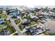 Captivating aerial perspective of charming homes, showcasing waterfront living and neighborhood streets at 806 Arlington Rd, Palmetto, FL 34221