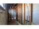 Exposed framing in the bathroom area, showing plumbing and layout at 806 Arlington Rd, Palmetto, FL 34221