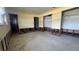 A spacious bedroom featuring closet space and large windows at 806 Arlington Rd, Palmetto, FL 34221