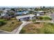 Charming single-story home with a well-maintained lawn, driveway, and mature palm trees at 806 Arlington Rd, Palmetto, FL 34221