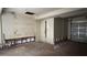 Garage offering potential, exposed interior with garage door and utility entrance at 806 Arlington Rd, Palmetto, FL 34221